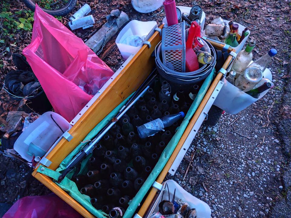 Waste-Buster gefuellt mit Glas